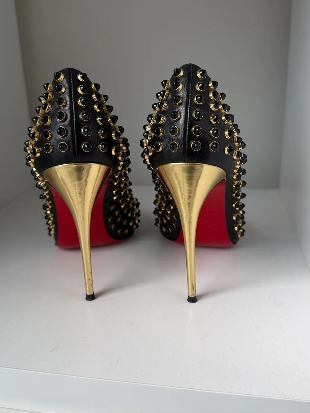 Christian Louboutin Black Leather Pointed-Toe Pumps with Gold Studs